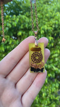 Load and play video in Gallery viewer, Tigers Eye EMF Protection Orgone Pendant
